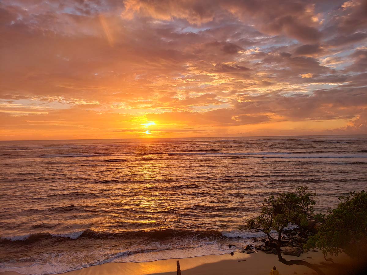 Watch sunrises at our oceanfront at Tiki Moon Villas